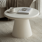Ronde witte salontafel van microcement