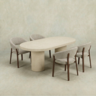 Beige capsule eettafel van microcement met beige poten