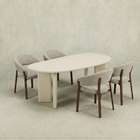 Beige organische eettafel van microcement met beige poten