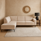 Beige hoekbank.