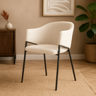 Luxe eetkamerstoel van beige linnen met zwart onderstel