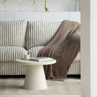 Ronde beige salontafel van microcement