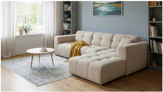 Hoe laat je een grote woonkamer knus aanvoelen?