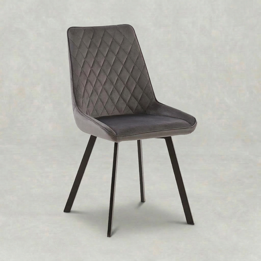 Fluweel grijze eetkamersotle met zwart onderstel