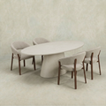 Witte ovale eettafel van microcement met witte poot