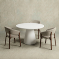Witte ronde eettafel van microcement met witte poot