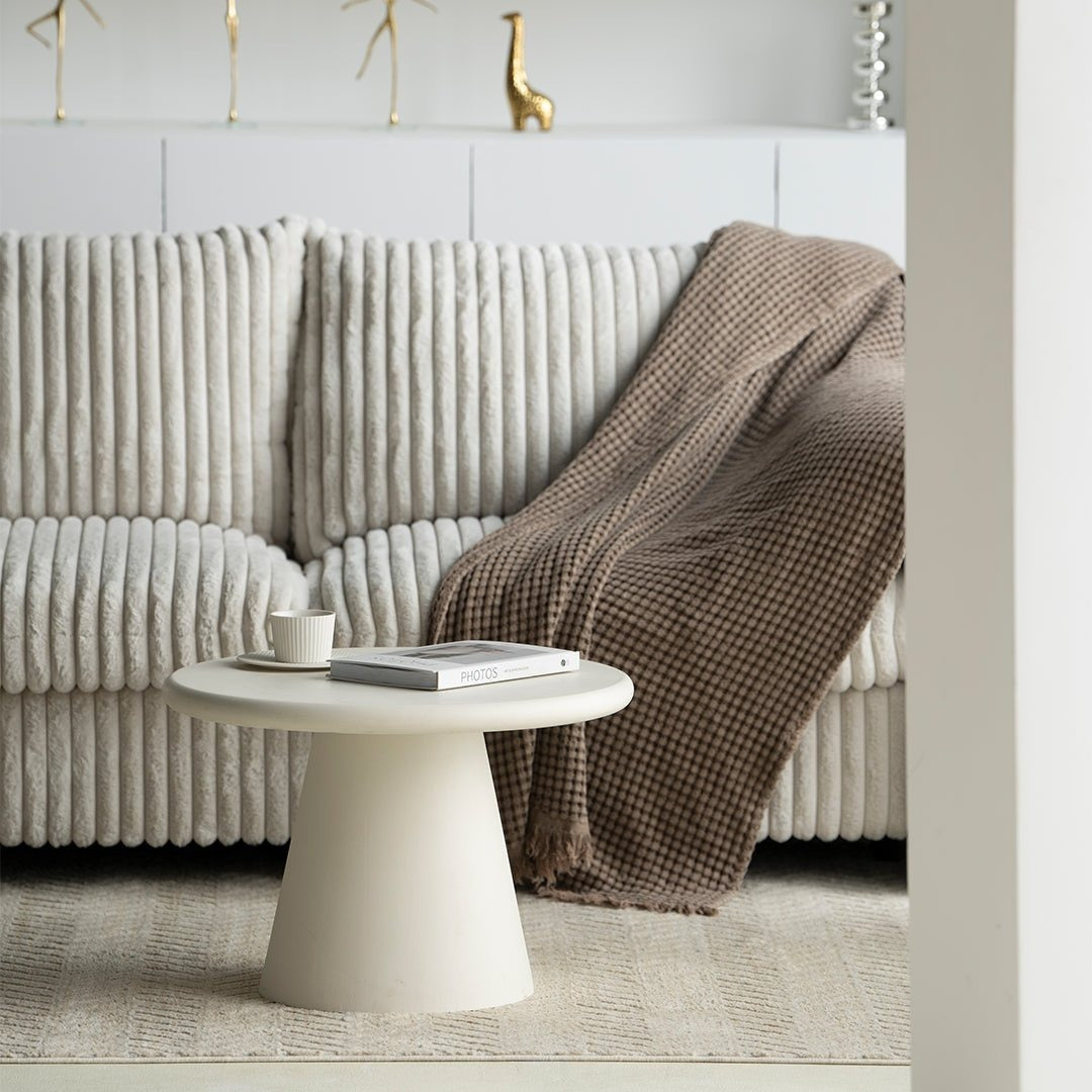 Ronde beige salontafel van microcement