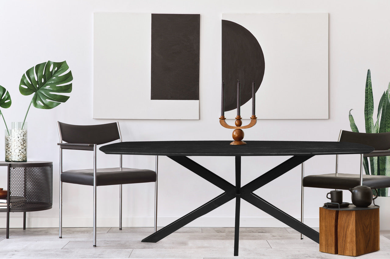zwarte eettafel deens ovaal met dun mangohouten blad en metalen spinpoot 180 cm breed
